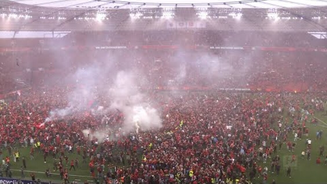 The moment Bayer Leverkusen fans stormed the pitch after WINNING their first ever Bundesliga…😱😱