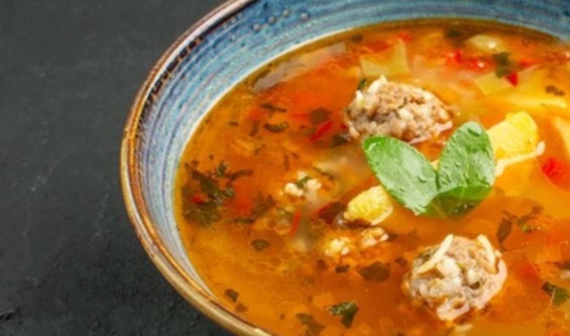 front-view-delicious-soup-with-meatballs-potatoes-dark-background_140725-91681